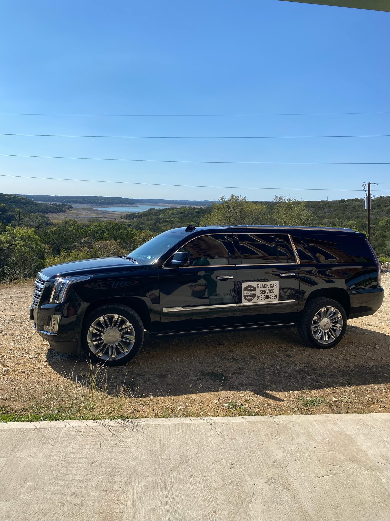 Black Escalade at a Texas Hill Country overlook