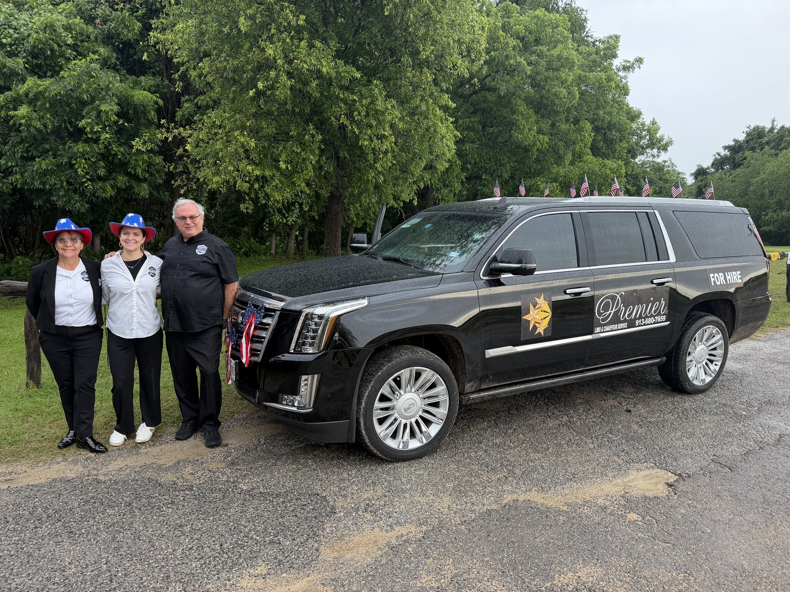 The Premier Plus black Cadillac Escalade, with the Walpole family